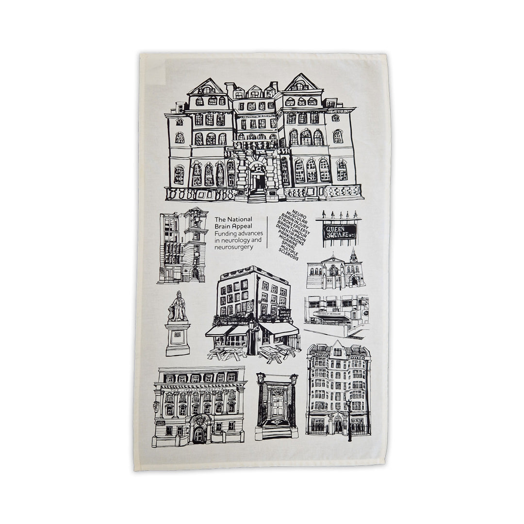Tea towel with black and white architectural illustrations on a white background