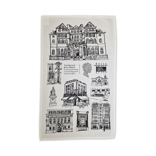 Tea towel with black and white architectural illustrations on a white background